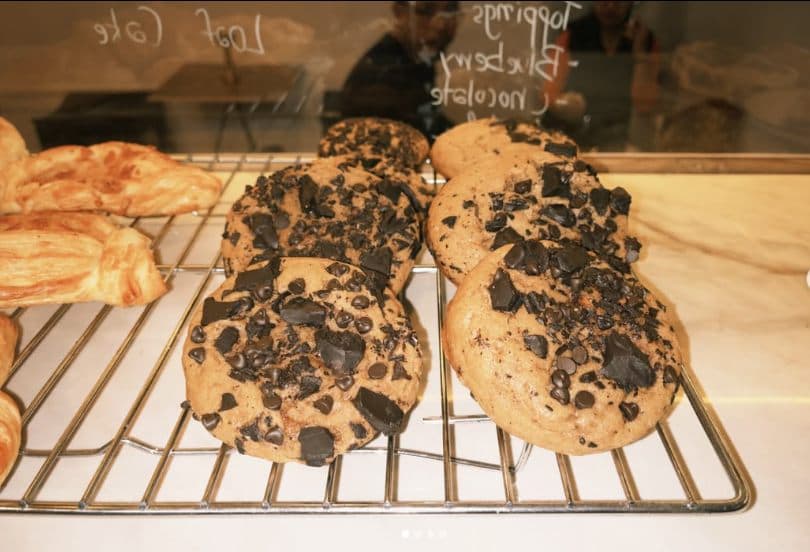 Fresh cookies cooling on a wire rack